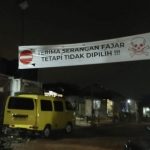 Warga Batam Bentangkan Spanduk 'Terima Serangan Fajar, Tetapi Tidak Dipilih!!!'